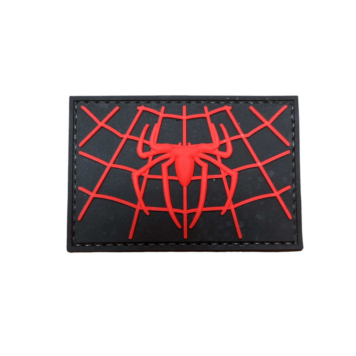 Spiderman web chest logo patch on black background, 3" x 2" PVC design for kids' uniforms and packs.