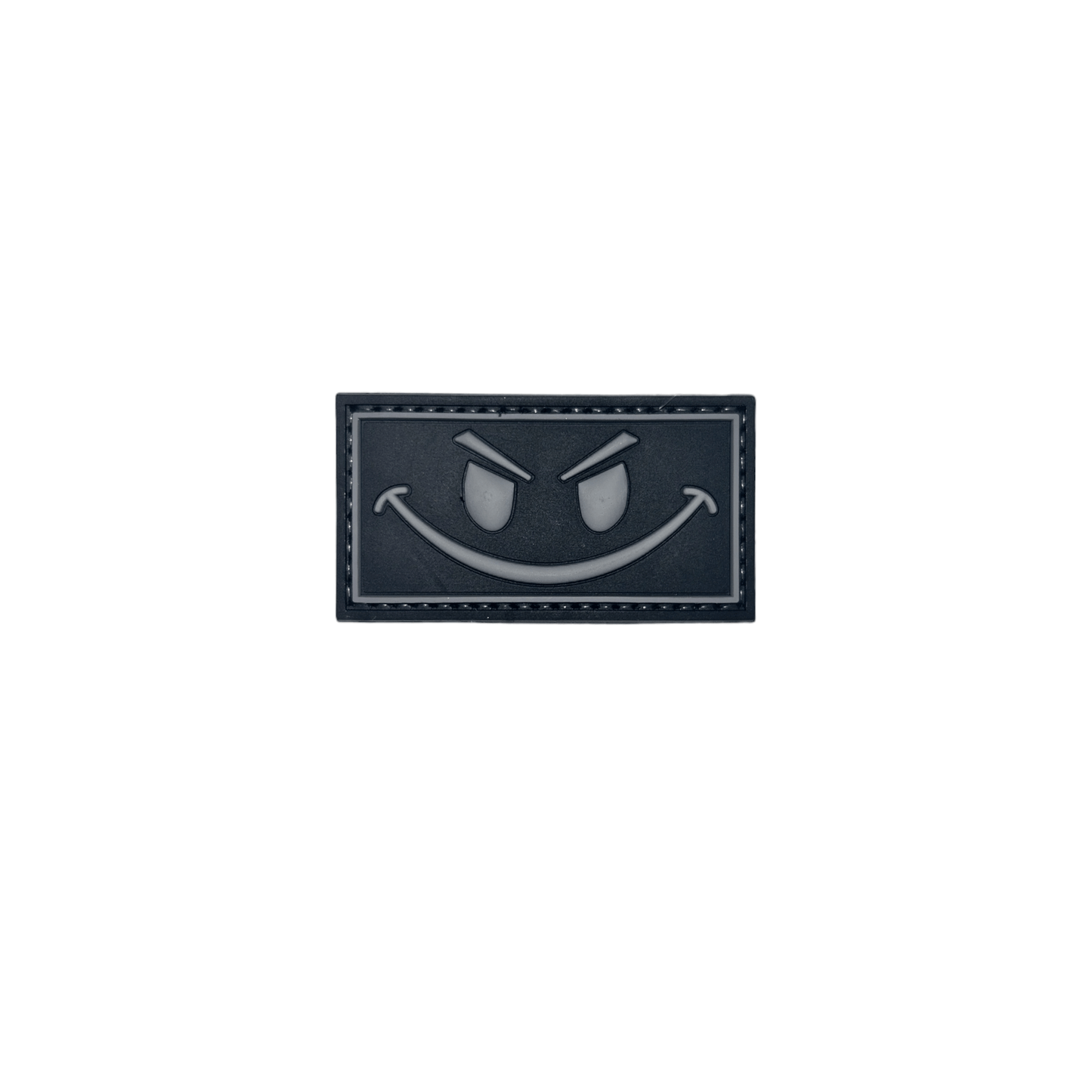 Patch Black and Gray Smiley PVC badge measuring 2 3/8" x 1 1/4" with hook-and-loop backing.