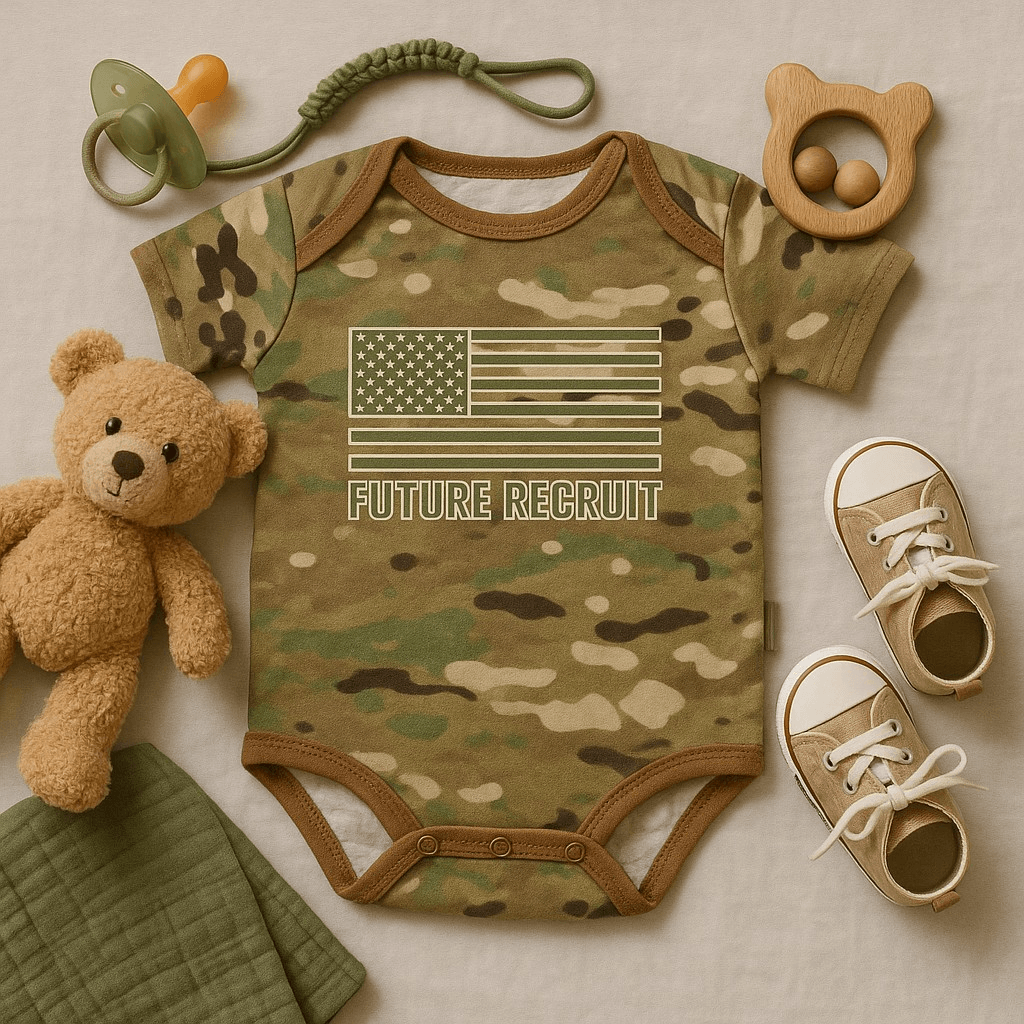 Baby Multicam Future Recruit Bodysuit on a flat surface, showing detailed camouflage pattern and infant clothing design.