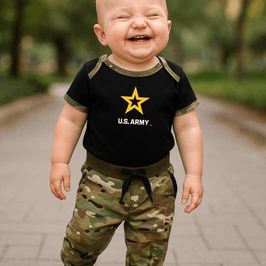 Cheerful baby wearing Army Multicam jogger set with U.S. Army logo, enjoying outdoors.