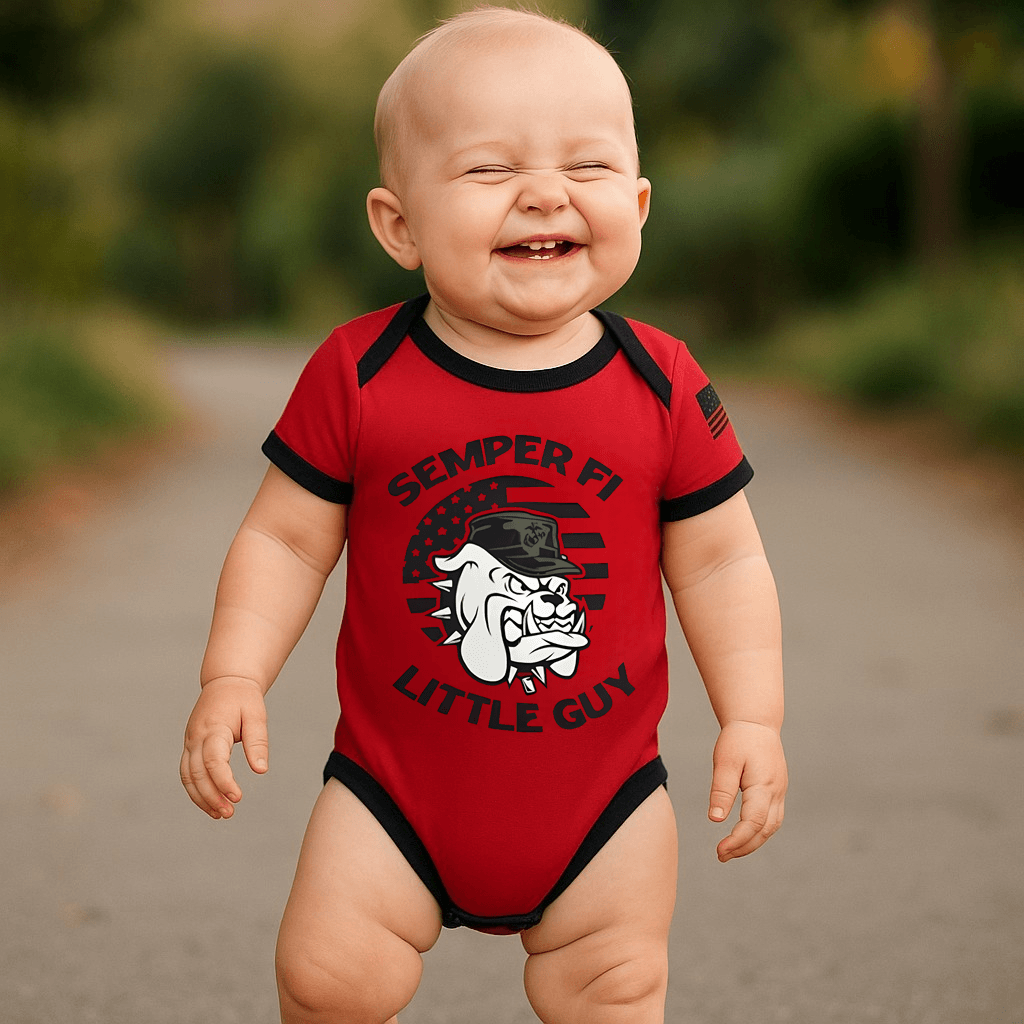 Adorable baby in a red Marines bodysuit with Semper Fi and a bulldog graphic, showcasing Marine pride.