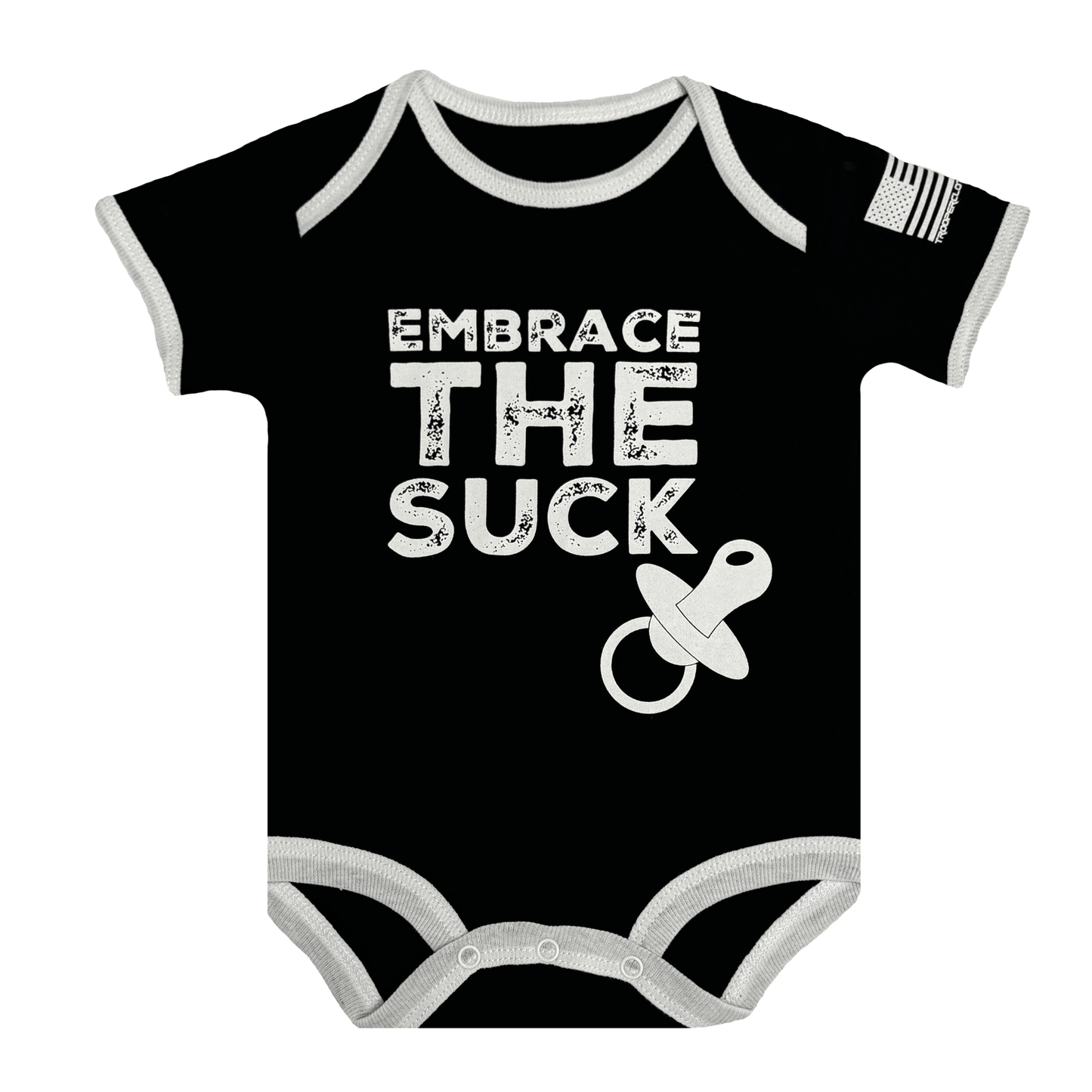 Baby bodysuit with black fabric, white text saying 'Embrace The Suck' and American flag sleeve.