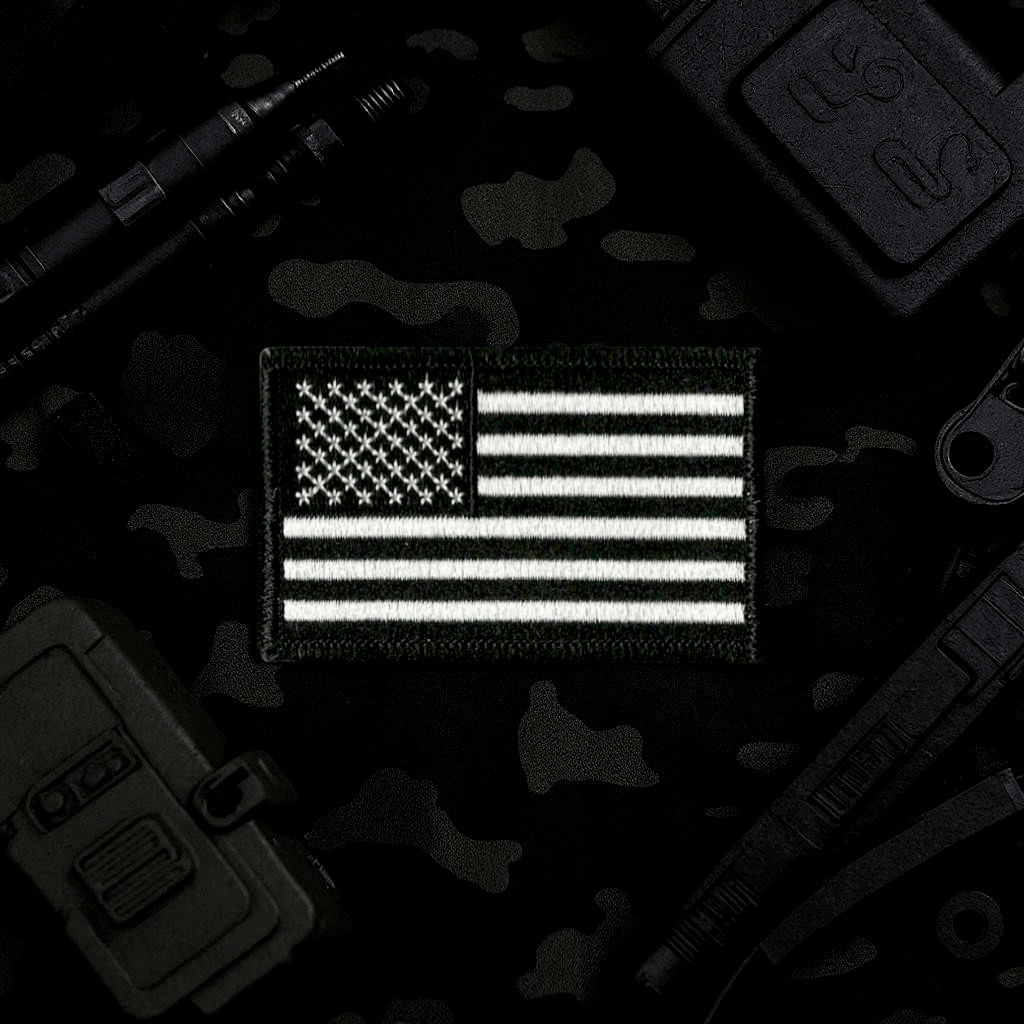 American Flag Patch in black and white, a symbol of patriotism and national pride, perfect for general use on clothing and accessories.
