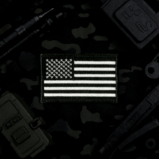 American Flag Patch in black and white, a symbol of patriotism and national pride, perfect for general use on clothing and accessories.