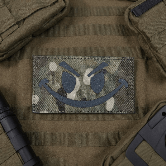Patch Smiley Multicam Evil Laser Cut patch on tactical gear for added style and visibility.