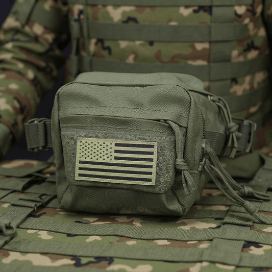 Tactical Fanny Pack OD Green with American flag patch on durable fabric, ideal for outdoor gear storage and organization.